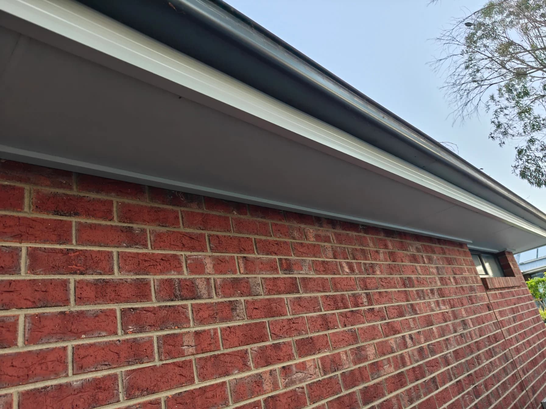 Roof eaves after pressure washing